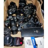 Nikon, Canon cameras with associated lenses, flash and accessories