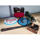 A Pratts Motor Oil cast iron sign, a similar Crossley sign, truncheon, field glasses etc