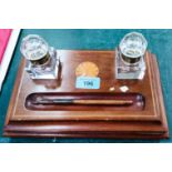 An Eden's inlaid mahogany 2 bottle inkstand.