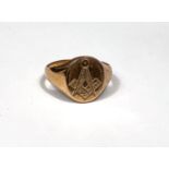 A 9 carat hallmarked gold signet ring engraved with masonic emblems, 5.5 gm