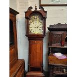 An early 19th century oak and mahogany longcase clock, with swan neck pediment and reeded side