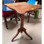 A rectangular top pedestal occasional table and a mahogany Chippendale mirror