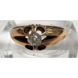 An 18 carat hallmarked gold ring with solitaire diamond in raised claw setting, 4.1gm, size 'Q',