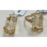 A 9 carat hallmarked gold dress ring set with shaped rectangular Champagne Quartz (10.79 carat, 19 x