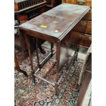 An Edwardian mahogany occasional table with drop leaves, on spider legs, width 68cm