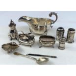 A hallmarked silver sauce boat (marks worn); various hallmarked silver cruet pieces; etc., 5.5 oz