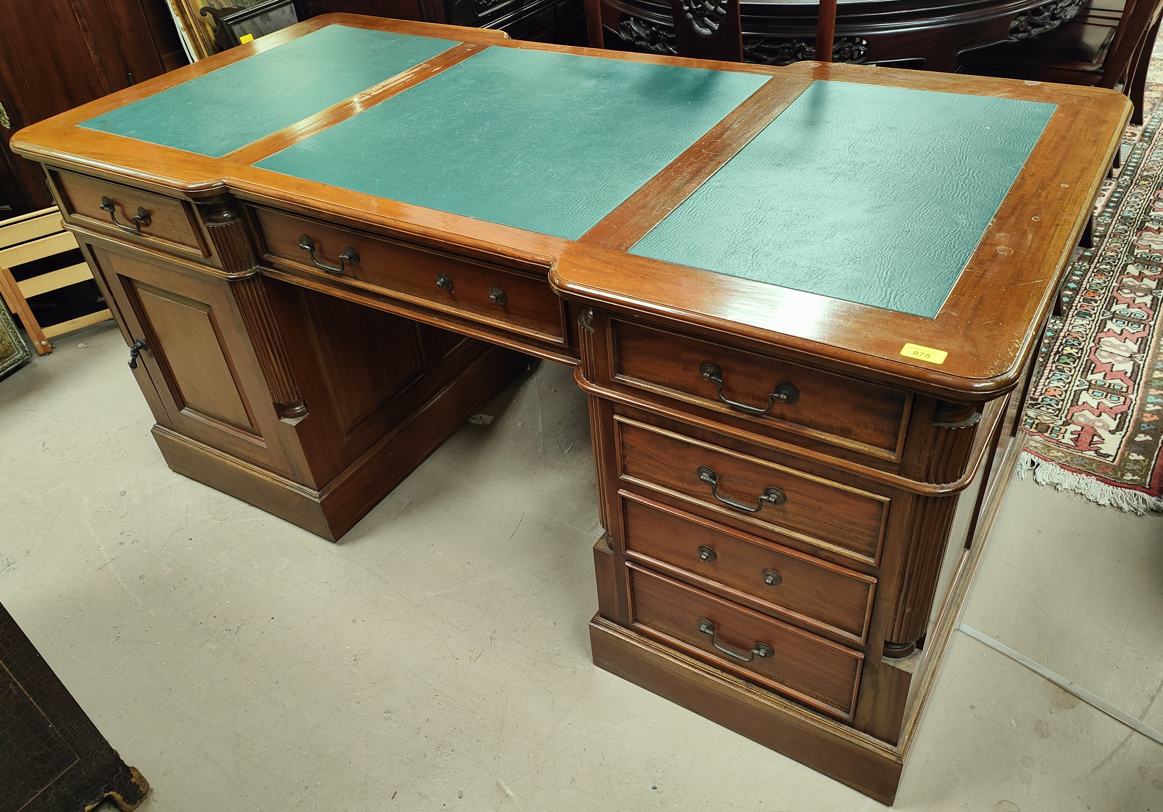 A period style mahogany partners desk with inset leather top, 6 frieze drawers, twin pedestals