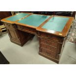 A period style mahogany partners desk with inset leather top, 6 frieze drawers, twin pedestals