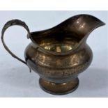 A sauce boat on raised circular foot, 1828, 4 oz