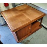 A mid 20th century teak modular coffee table with cupboards/shelves under by Nathan