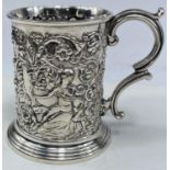 A 19th century EPNS tankard with double scroll handle and ornate classical style relief decoration
