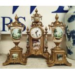 A modern reproduction gilt & ceramic clock garniture decorated with French chateaux scenes, dial