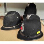 Three vintage Police helmets and a vintage banjo (a.f)