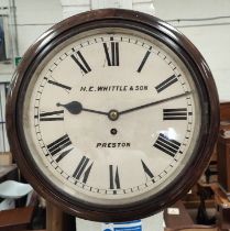 A circular stained mahogany wall clock with single train fusee movement by H.E.Whittle & Sons