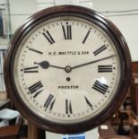 A circular stained mahogany wall clock with single train fusee movement by H.E.Whittle & Sons