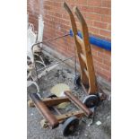 A vintage sack truck; a winding metal stand; a 2 wheel piano truck; a towel rail