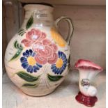 A Victorian red and white toilet set; large jugs; etc.