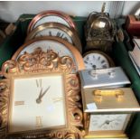 A reproduction brass lantern clock; other wall and mantel clocks