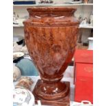 A large urn shaped vase in the classical style with mottled brown glaze, on pedestal base, height