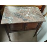 A mahogany inlaid marble top wash stand