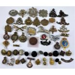 A selection of military badges etc