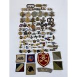 A selection of military badges etc