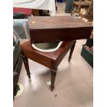 A 19th century mahogany bidet stool with matched ceramic liner; a similar stool (no liner or cover)