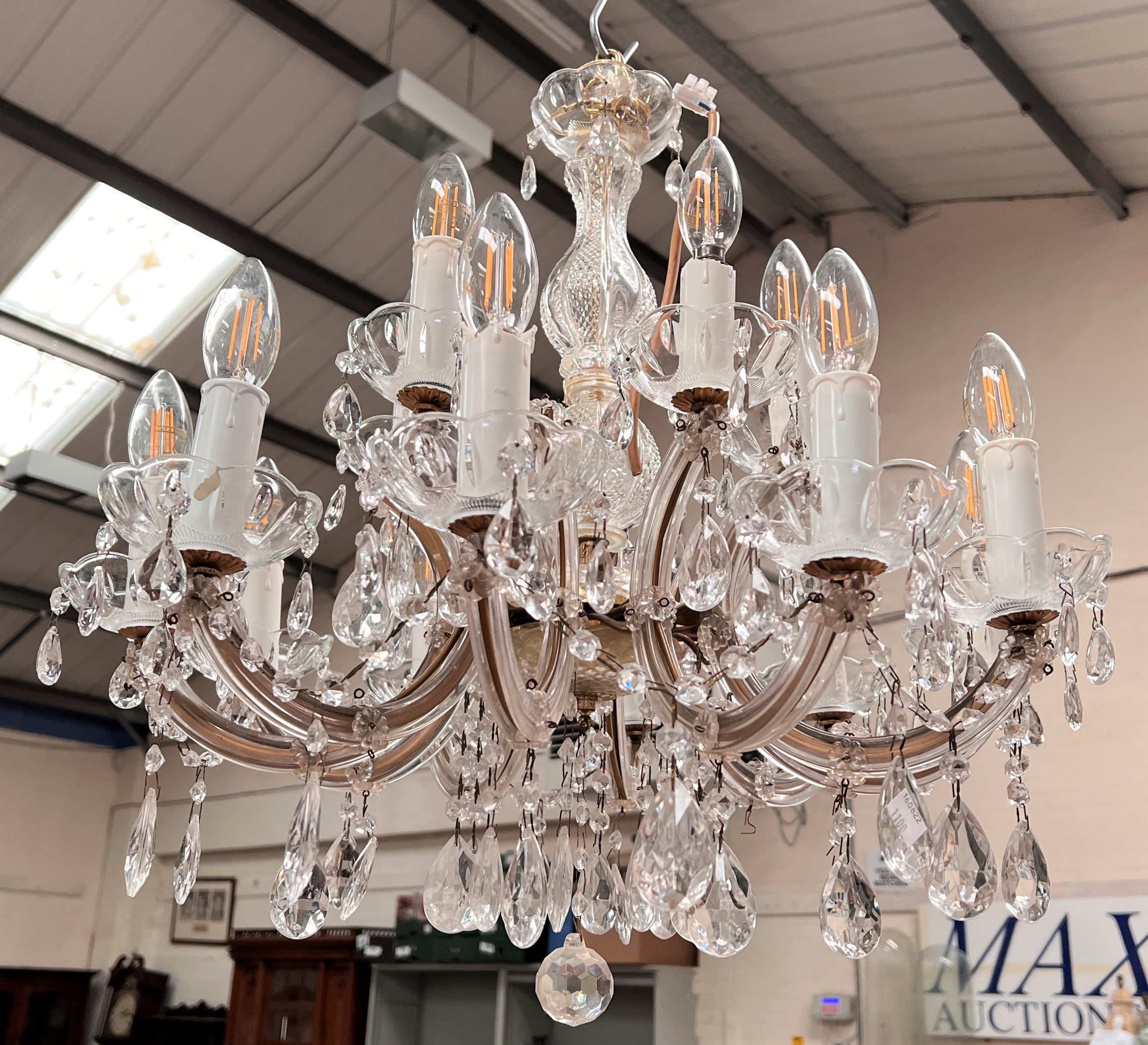 A 10 branch chandelier with cut glass drops.