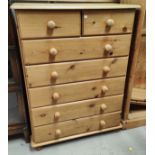 A modern pine chest of 5 long ad 2 short drawers