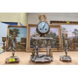 A 19th French gilt and marble clock garniture with swag leaf and laurel decoration, with white