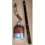 A silver plated hip flask with leather surround, a vintage flute (a.f) and a small horn club