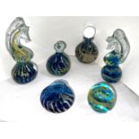 Three Mdina glass paperweights; 2 Mdina glass scent bottles; a squat vase