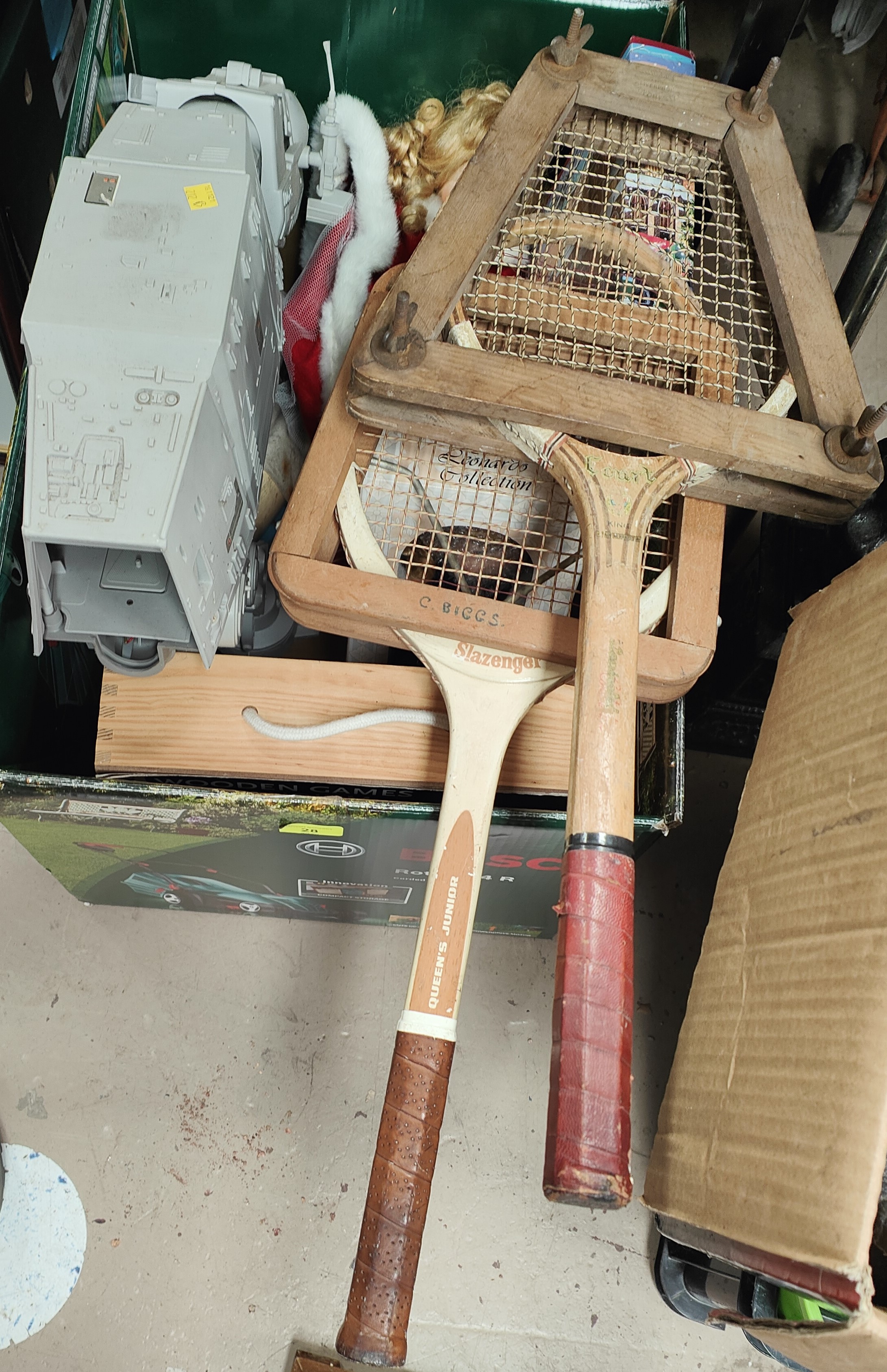 Two vintage tennis racquets; a WHS games compendium; dolls; a Star Wars monster; other toys