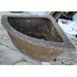 A cast iron corner water trough, 68cm