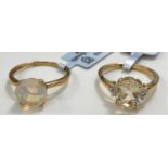 Two 9 carat hallmarked gold ladies dress rings, one set with a round Ethiopian opal, 1.7 carat,