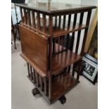 A 1930's oak revolving bookcase