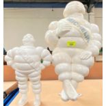 Two original Michelin Men Advertising Figures, one larger, on a metal stand (a.f. drill holes and