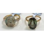 Two 9 carat hallmarked gold ladies dress rings, one set with5.48 carat Aquaprase flaned by 4 white