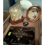 A Coromandel and brass book front; a photo of Greta Garbo; a large rock crystal etc