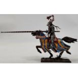 An AeroArt hand painted Russian knight on horseback with lance, fish helmet and regalia, stamped