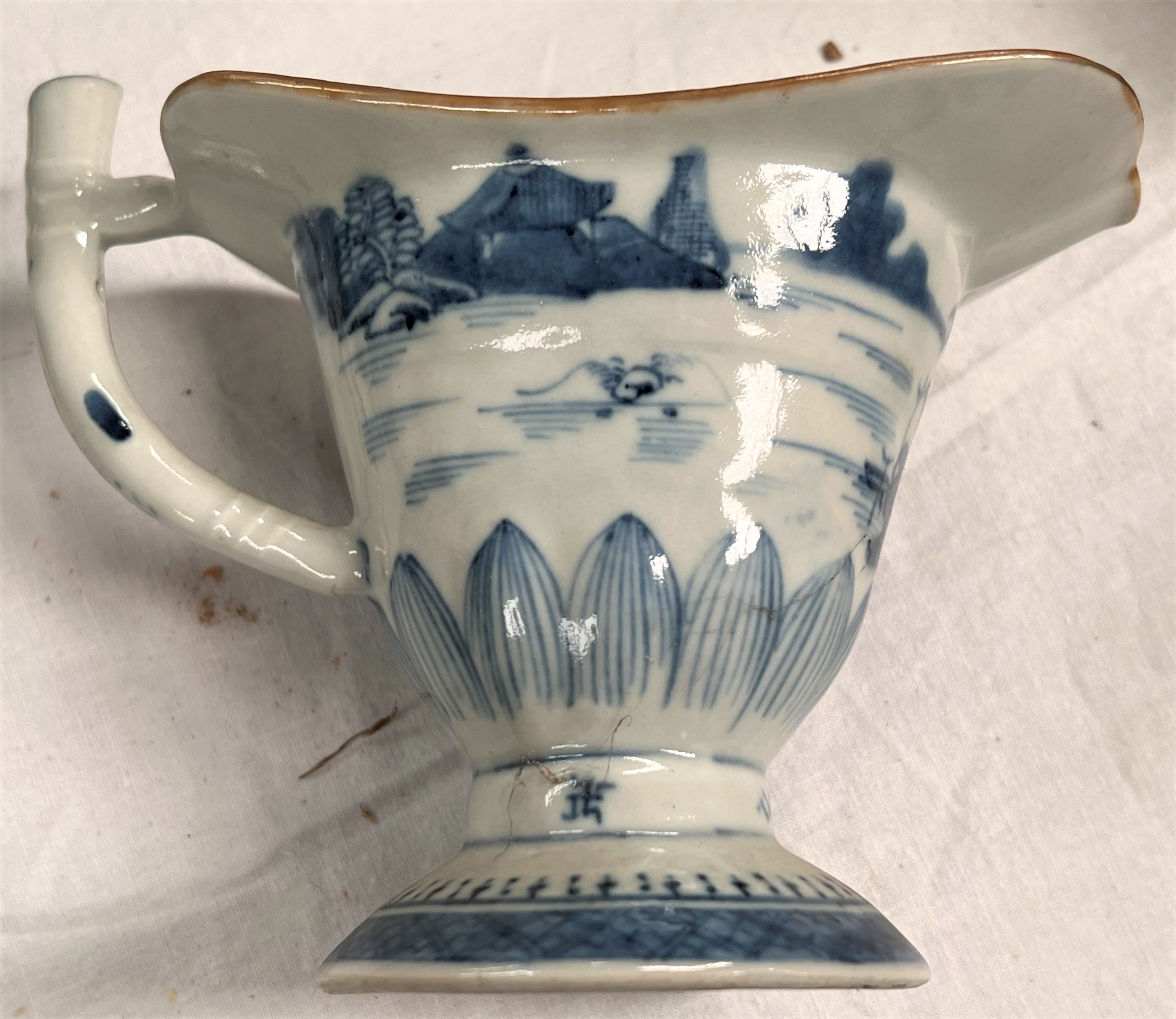 A 19th century Chinese pair of blue & white jugs decorated with pagodas, height 13cm; a similar - Image 6 of 7