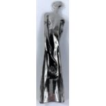 A white metal modernist unusual shoehorn in the form of a female figure, signed Carrol Boyes,