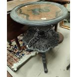 A late 19th century Chinese unusual occasional table, the circular burrwood inset top decorated with