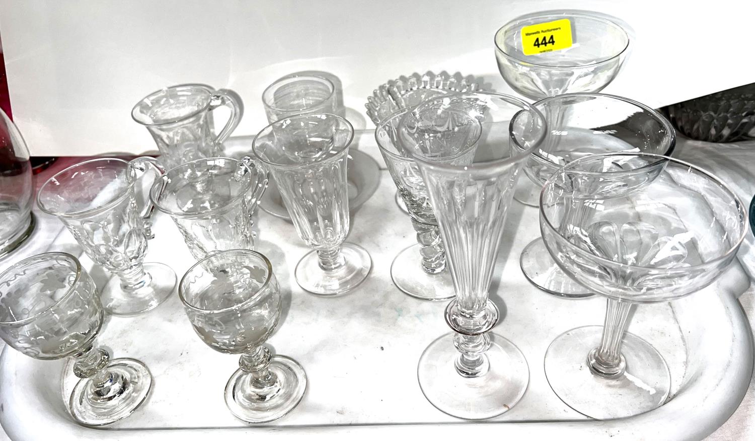 A selection of 19th century wine glasses:  hollow stem champagnes; slice cut flutes; lustre glasses;