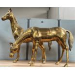 Two large brass horses