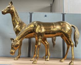 Two large brass horses