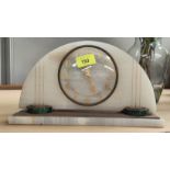 An Art Deco white marble and malachite mantel clock