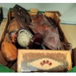 A selection of carved tribal masks, other treen etc.