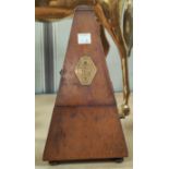 A wooden cased metronome