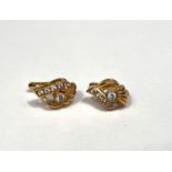 A 9 carat hallmarked gold pair of earrings each set 6 x CZ, 3.2 gm